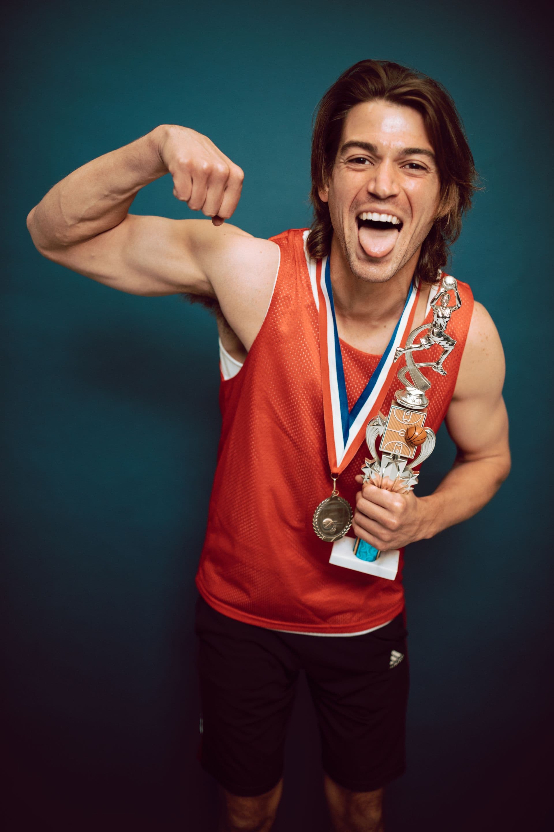 Athlete celebrating with a trophy